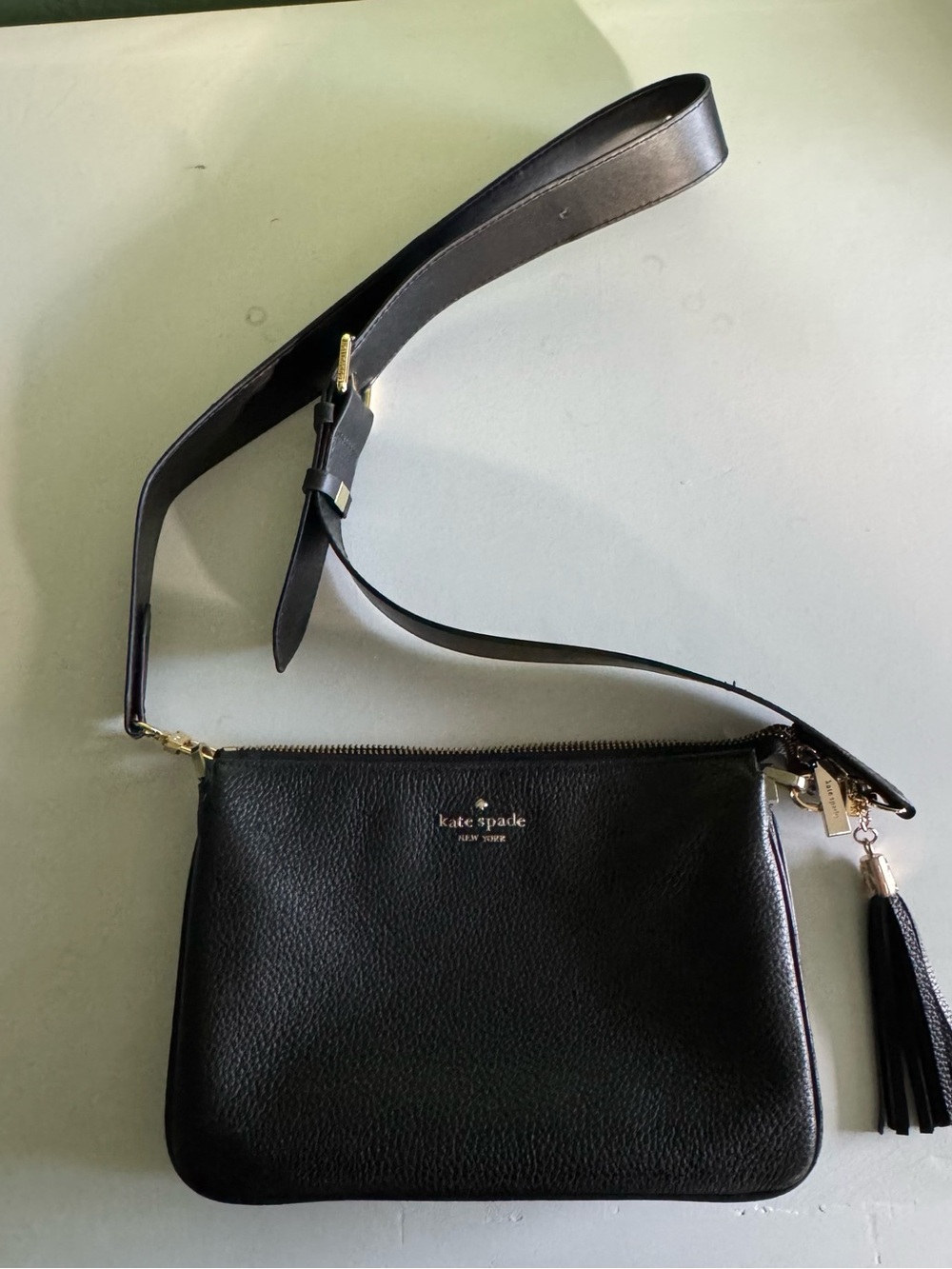 kate spade Black Leather Crossbody with Gold Hardware and Tassel
